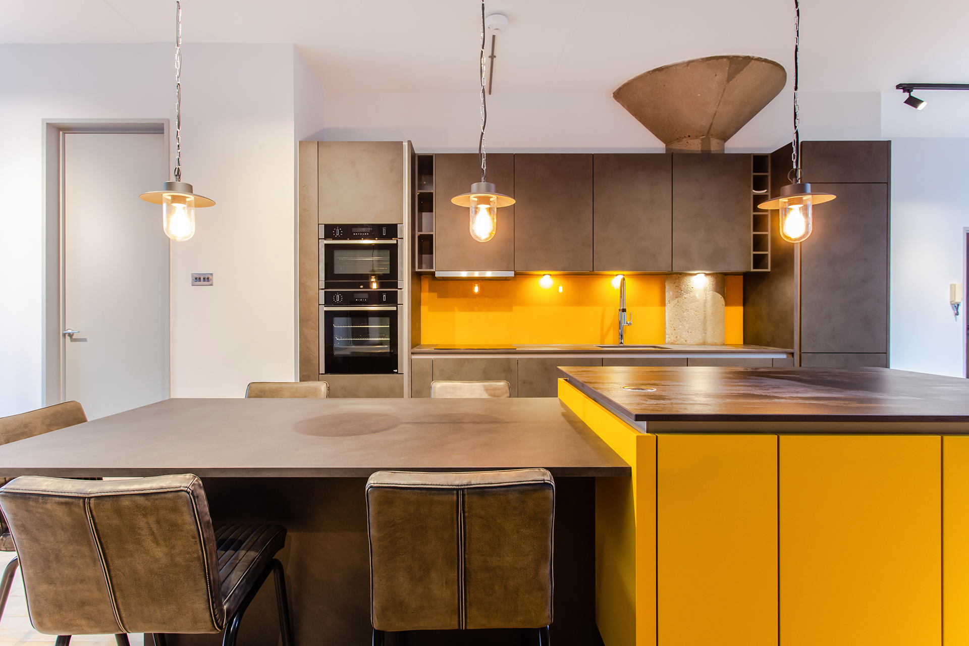 C&C kitchens Hertfordshire - Nolte Kitchens Polished Concrete and Curry