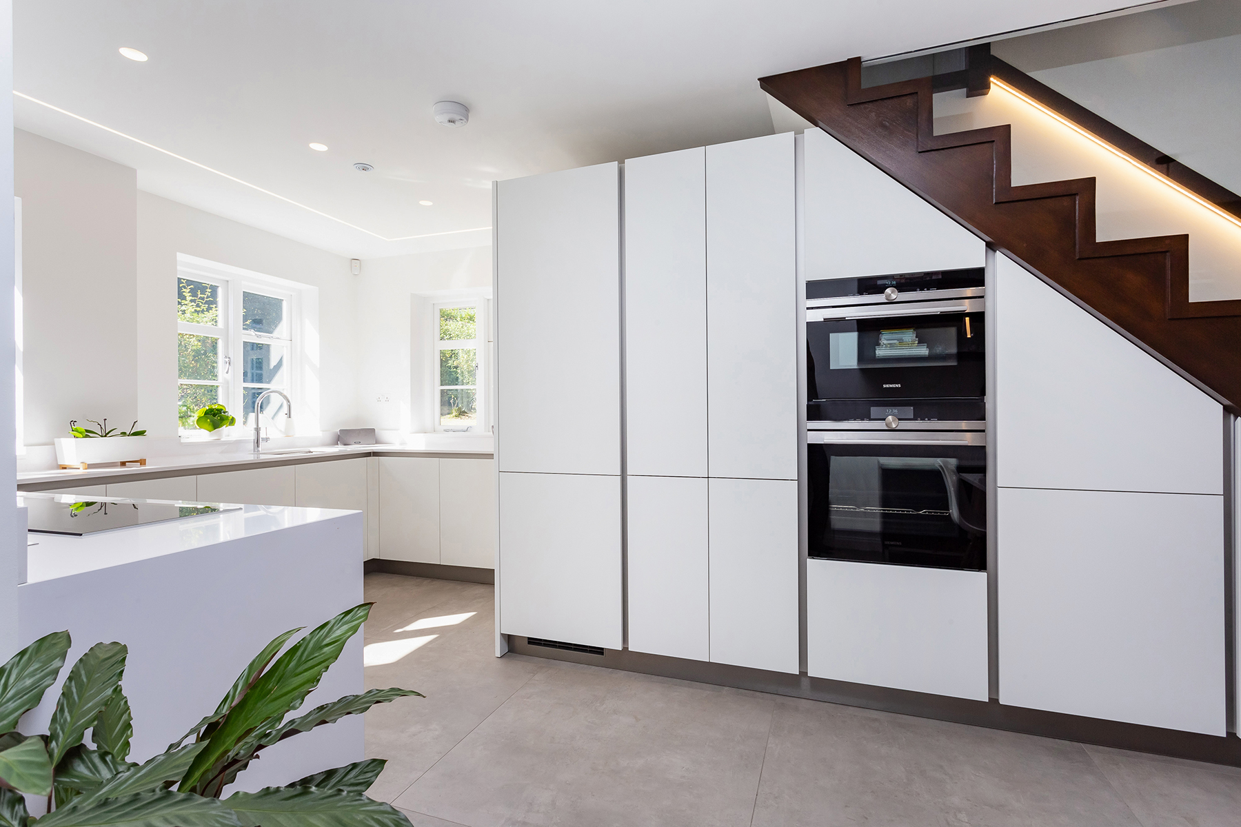 Nolte Kitchens Handleless kitchen in matt white