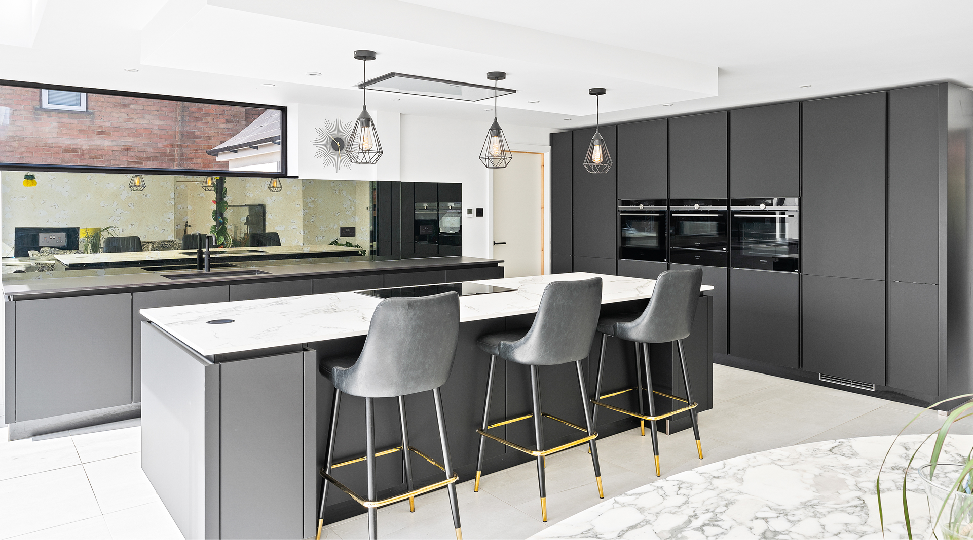 C&C kitchens Hertfordshire - Nolte Kitchens Matt Black Handleless Kitchen