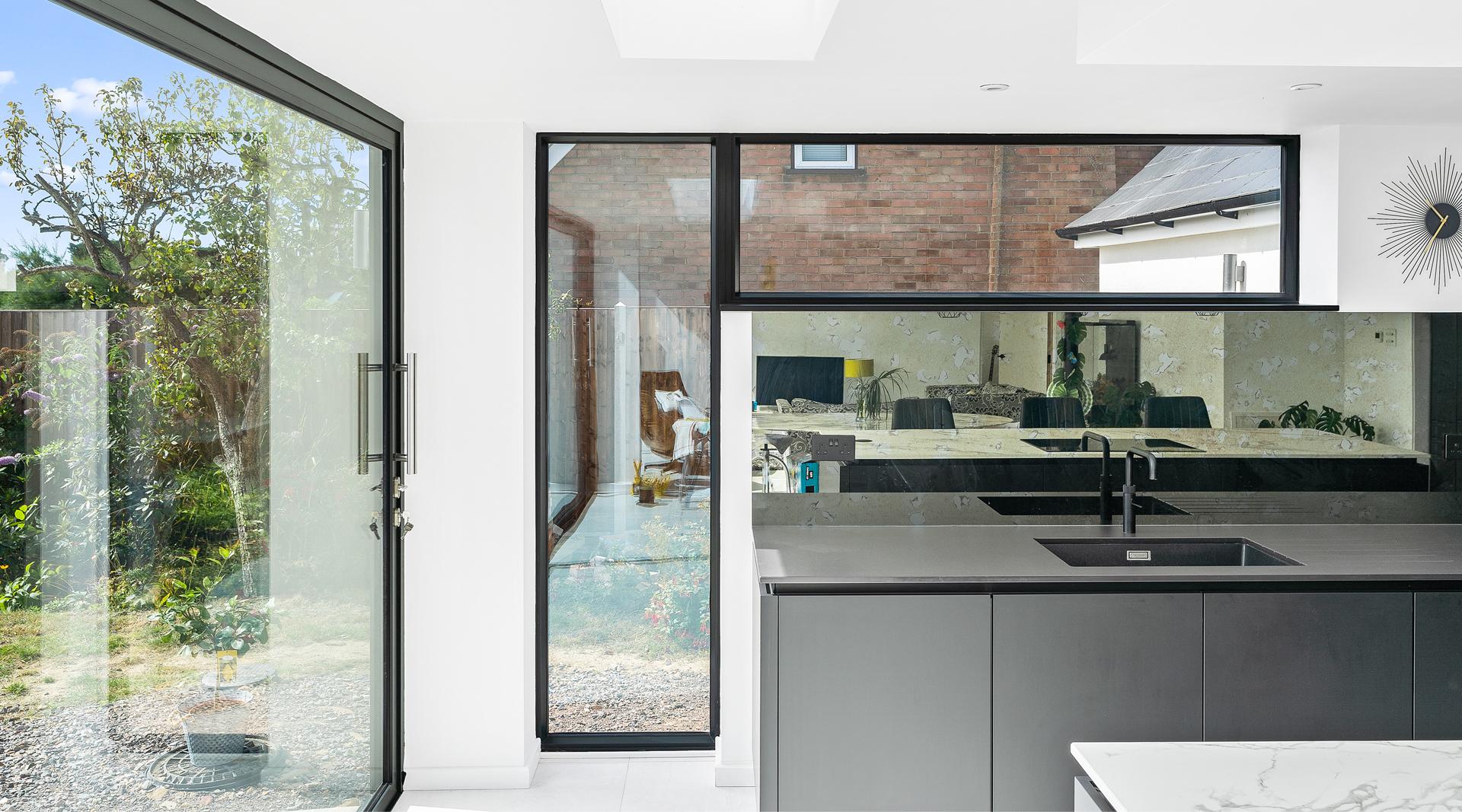 C&C kitchens Hertfordshire - Nolte Kitchens Matt Black Handleless Kitchen