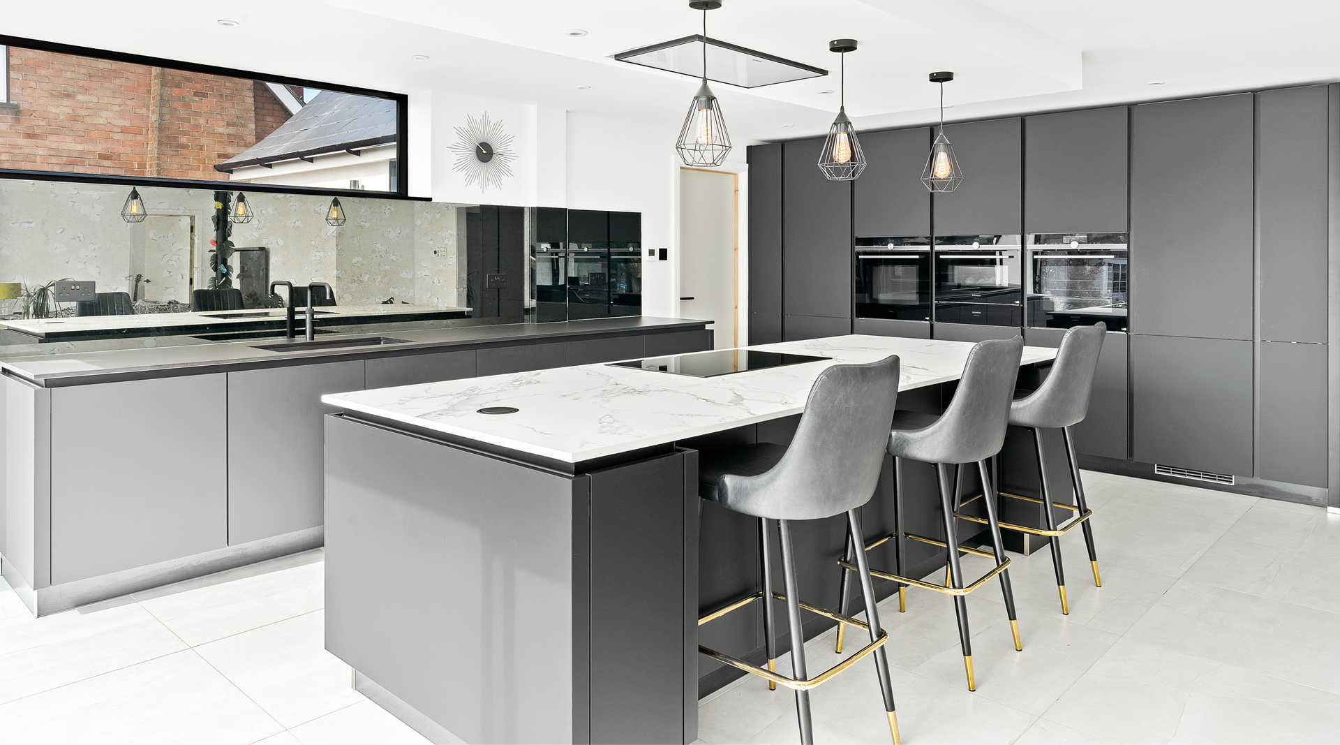 C&C kitchens Hertfordshire - Nolte Kitchens Matt Black Handleless Kitchen