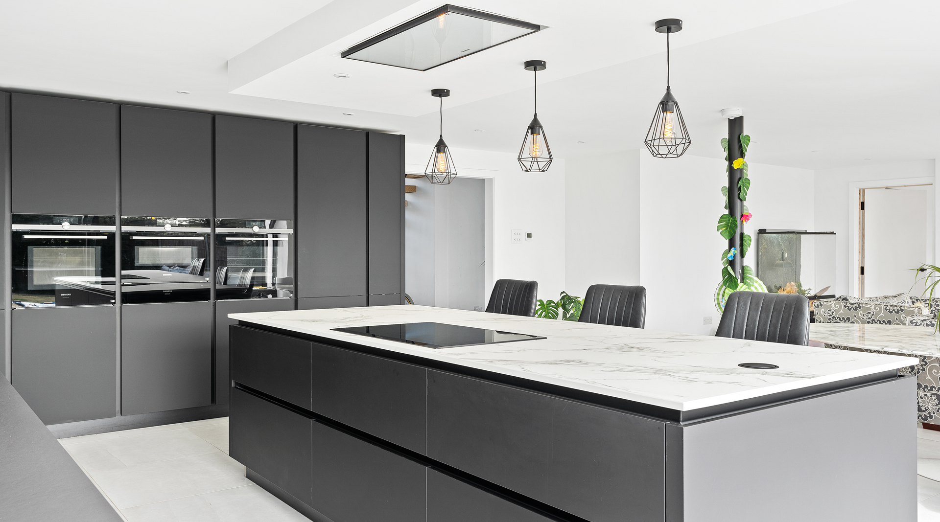 C&C kitchens Hertfordshire - Nolte Kitchens Matt Black Handleless Kitchen