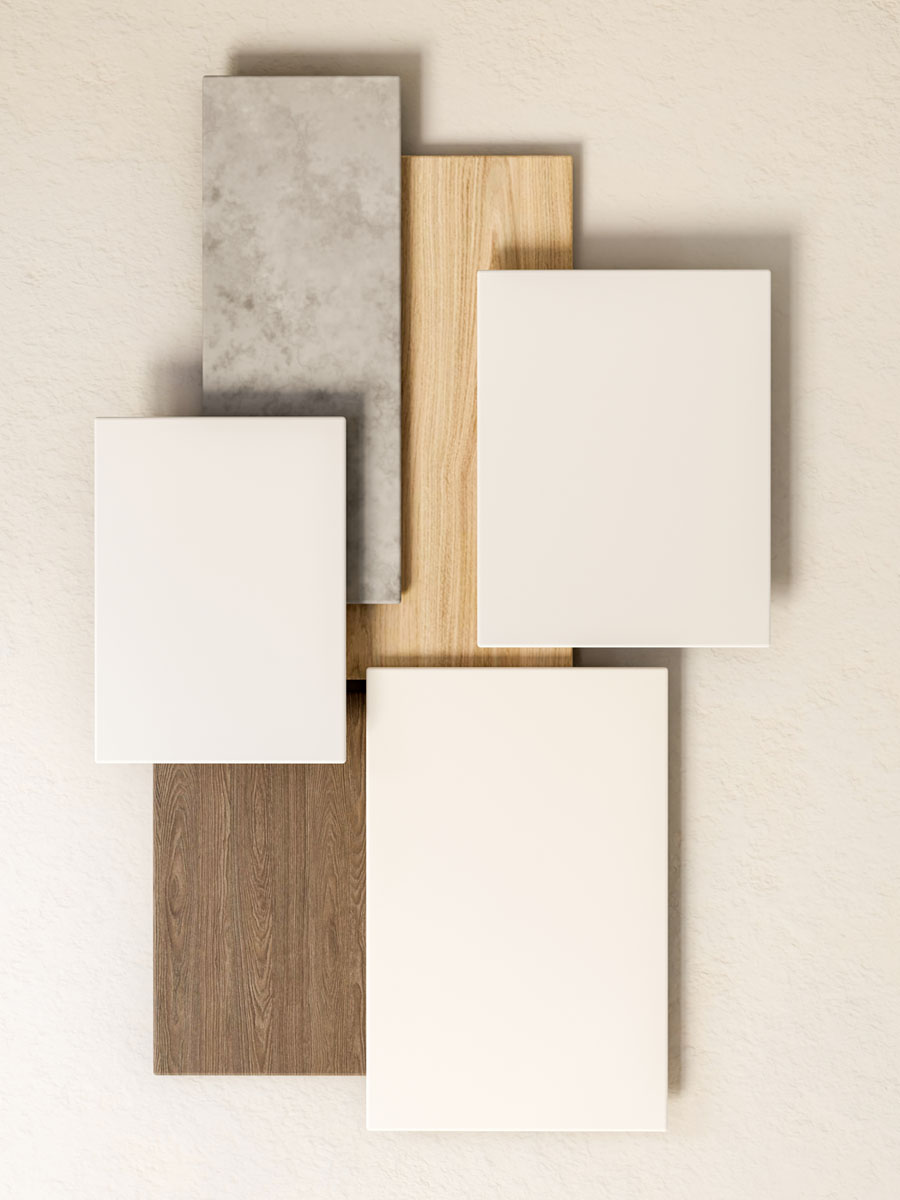 Kitchen plans, cabinet samples and worktop finishes arranged for a professional kitchen design consultation